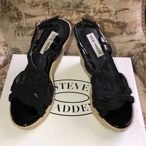 Steve Madden black platform wedge. Gently used.